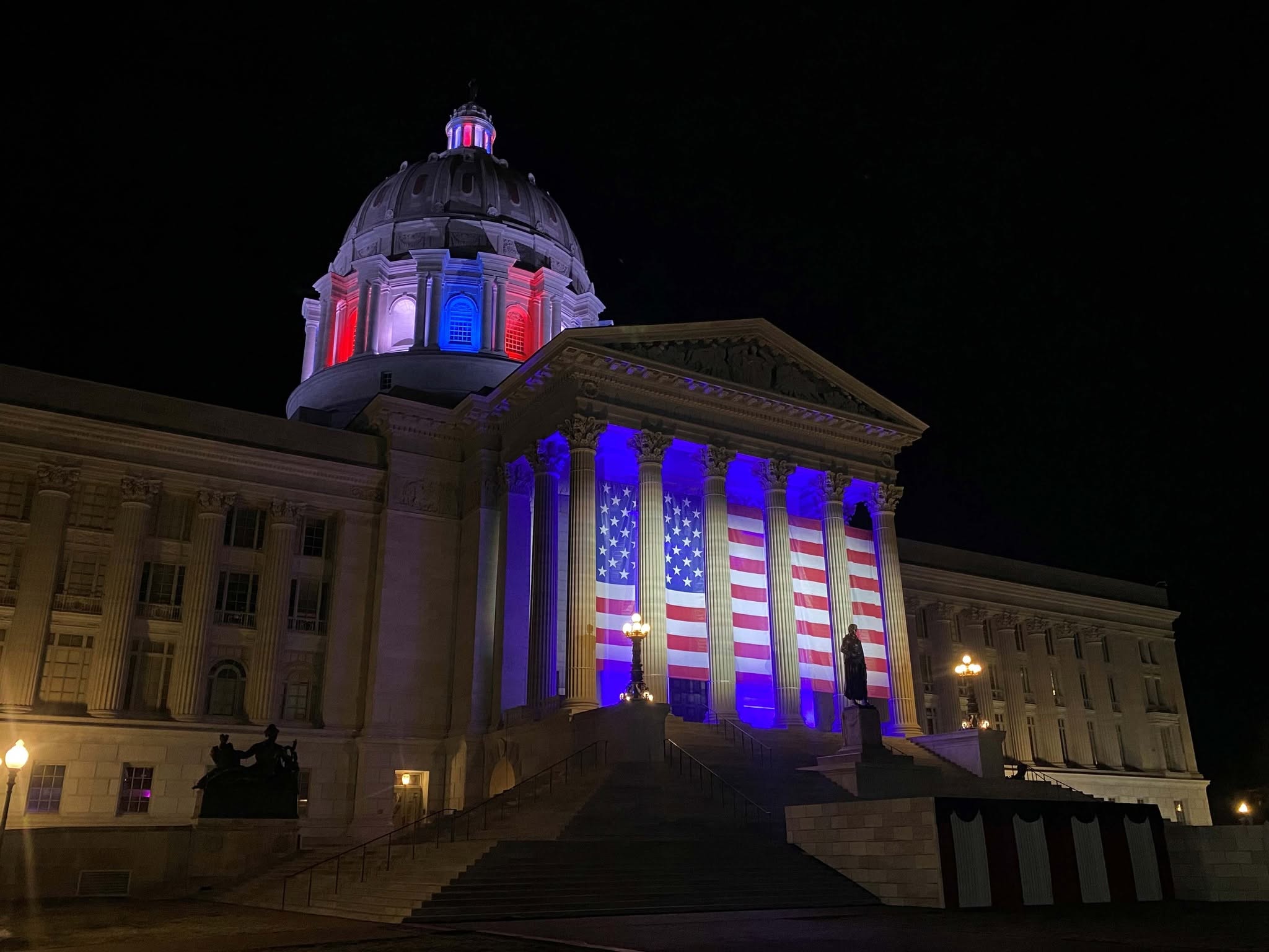 the capitol lighted up in red, white and blue